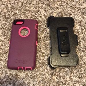A burgundy and pink OtterBox
